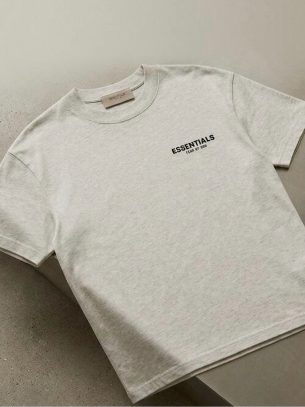ESSENTIALS Kids Short Sleeve Tee in Cream with Black Logo